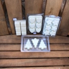 Example of four different designs of Wax Melts, Hearts, Square, Star and Christmas Trees
